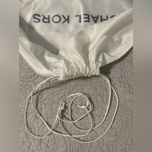 Michael Kors satin bag. Empty drawstring bag only. No purse.